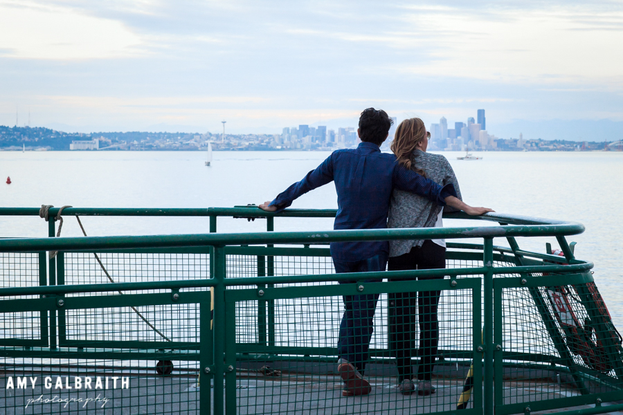 couple in front of seattle styling on a ferry ride