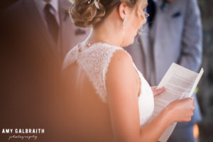 bride reading vows on wedding day