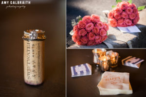 wedding rings on wine cork with personalized napkins and coral bouquets