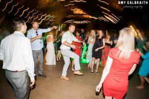 dancing during long exposure at wedding reception