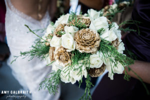 gold and white pinecone wedding bouquet