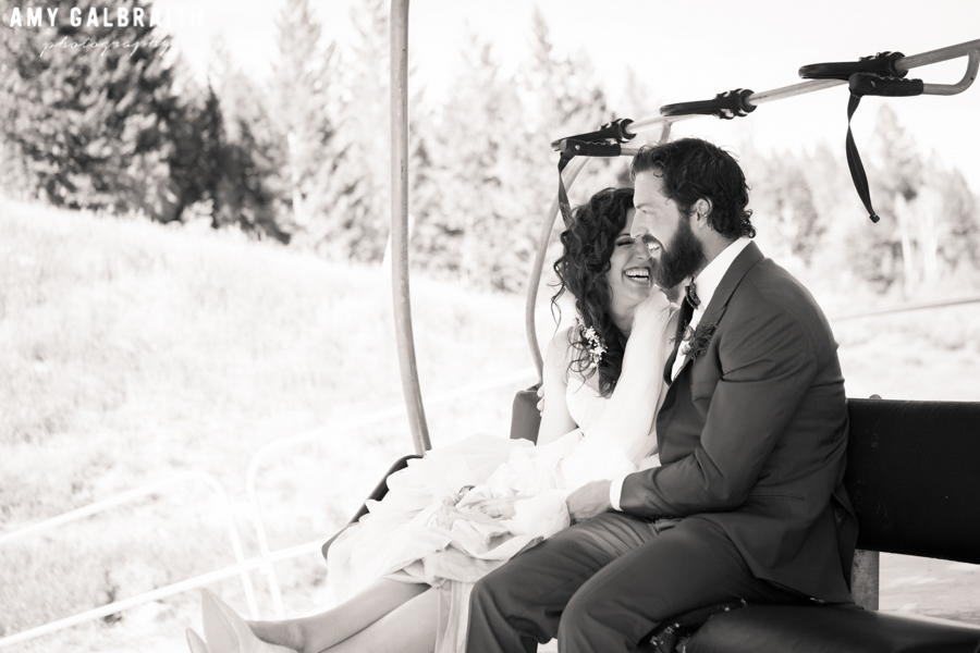 bride and groom boarding chairlift at jackson hole mountain resort