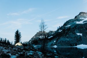 night photo of a tent at wing lake