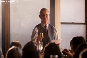 father of the bride giving a toast at the granary wedding