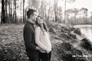 black and white photo of couple near snoqualmie river