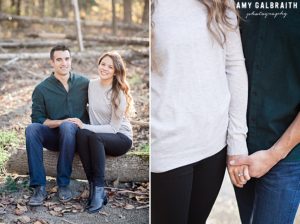 couple sitting on log near snoqualmie river