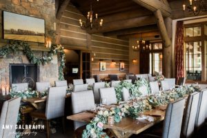 long floral tablescape by someday soon flowers in jackson hole at snake river sporting club