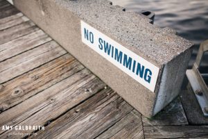 no swimming sign on the dock of carillon point