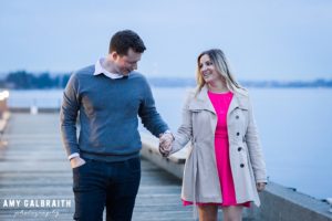 couple walking together on the dock at carillon point