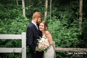 bride and groom laughing together on wedding day