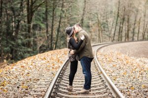girl in cute hat during fall engagement session at stevens pass