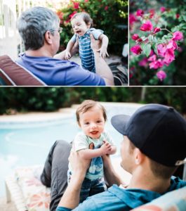 baby being played with outdoors with desert flowers