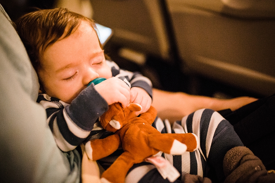 baby sleeping on airplane