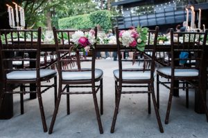 bride and groom chairs with floral design