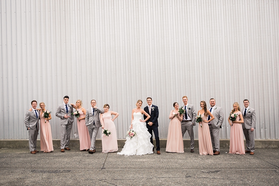 pink and grey wedding party in urban setting