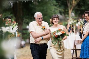 father walking bride down the aisle