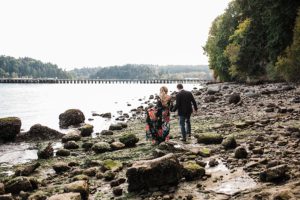 couple walks on the beach at manchester state park
