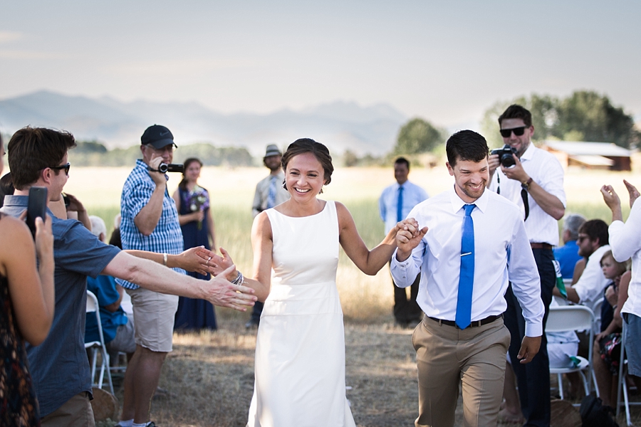 bride high fives guests after saying i do in the methow valley