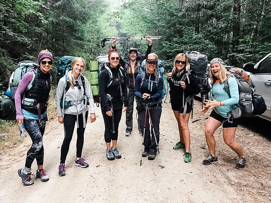 women excited about backpacking