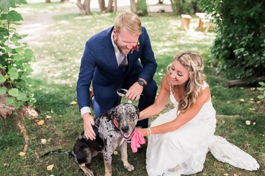 bride and groom with their dog before linn canyon ranch wedding