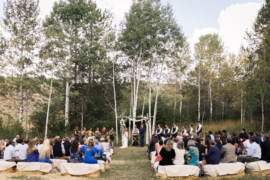 wedding ceremony with aspen trees at jackson hole wedding venue linn canyon ranch