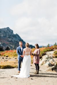 A couple says their marriage vows during a backcountry wedding as they elope at mt rainier