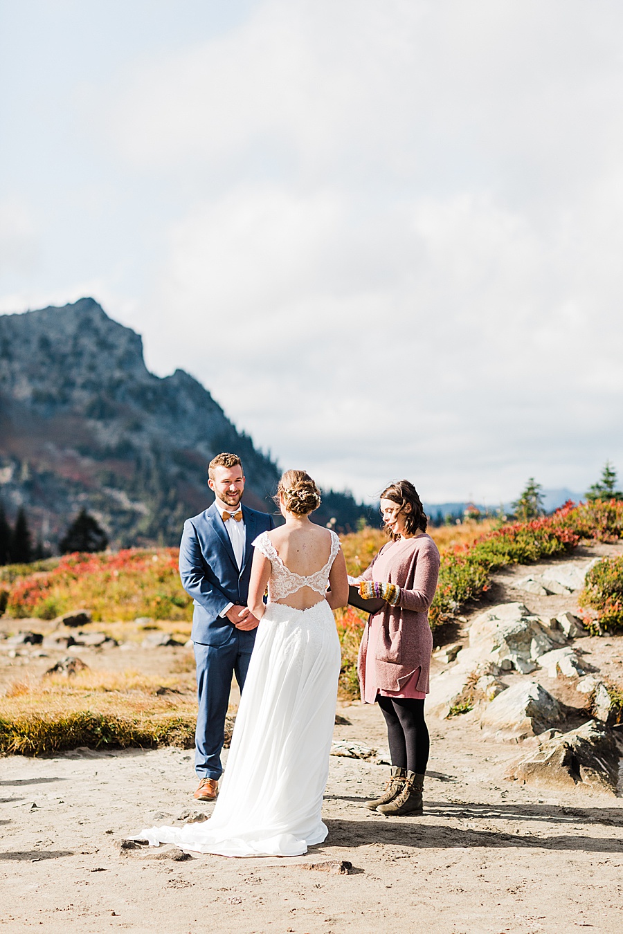A couple says their marriage vows during a backcountry wedding as they elope in mt rainier
