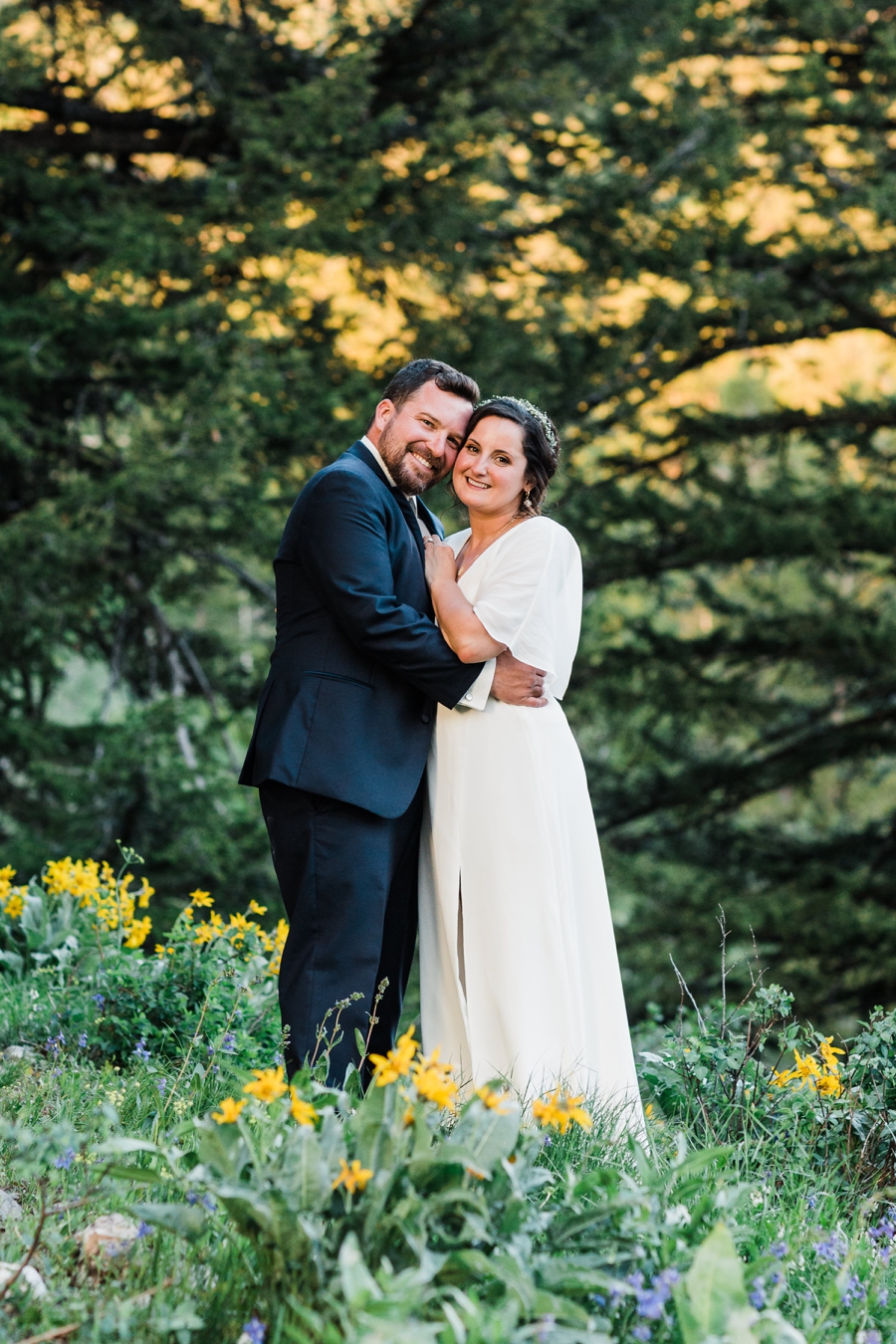 Bride and groom enjoy alpenglow on the mountains at Grand Targhee Resort by Jackson Hole wedding photographer Amy Galbraith