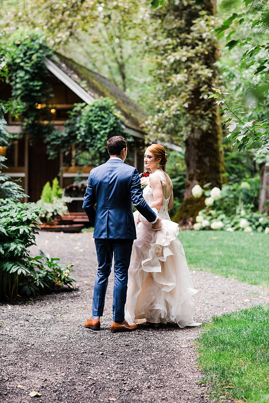 A couple gets married in the woods at a wedding venue in the greater Seattle area by outdoor wedding photographer Amy Galbraith