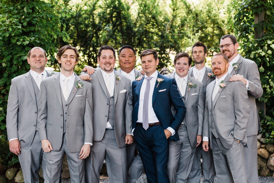 Groomsmen wearing grey and navy for a Snohomish wedding at Green Gates at Flowing Lake by Seattle wedding photographer Amy Galbraith