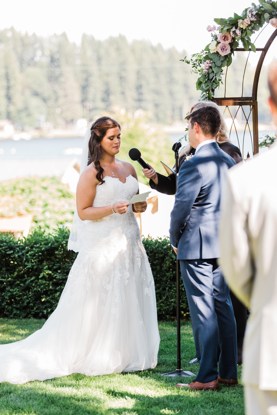 Wedding ceremony at Snohomish wedding venue Green Gates at Flowing Lake by Seattle wedding photographer Amy Galbraith