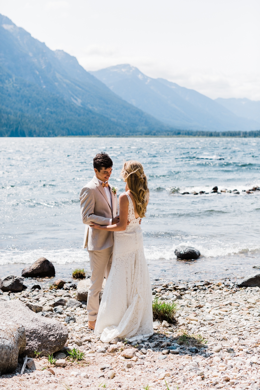 First look on Lake Wenatchee with a bride and groom