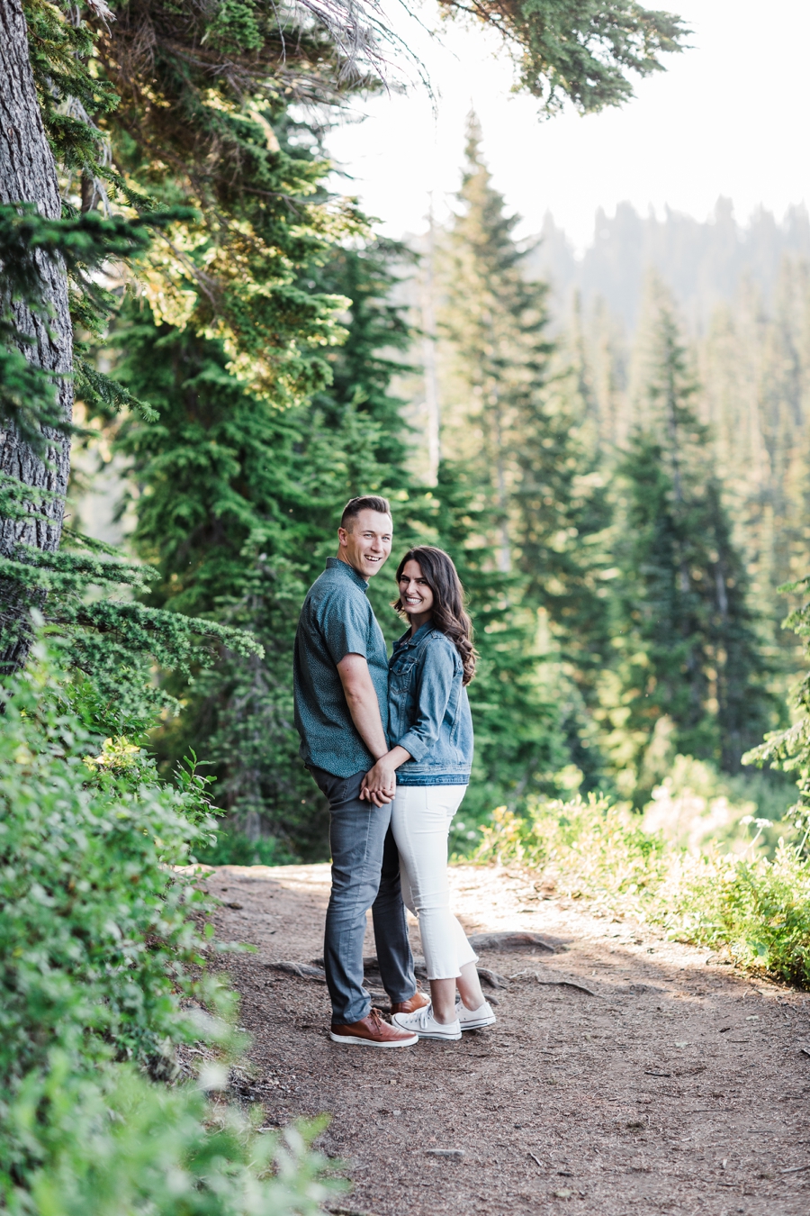 A couple poses for mountain wedding photographer Amy Galbraith during their Mt Rainier engagement session