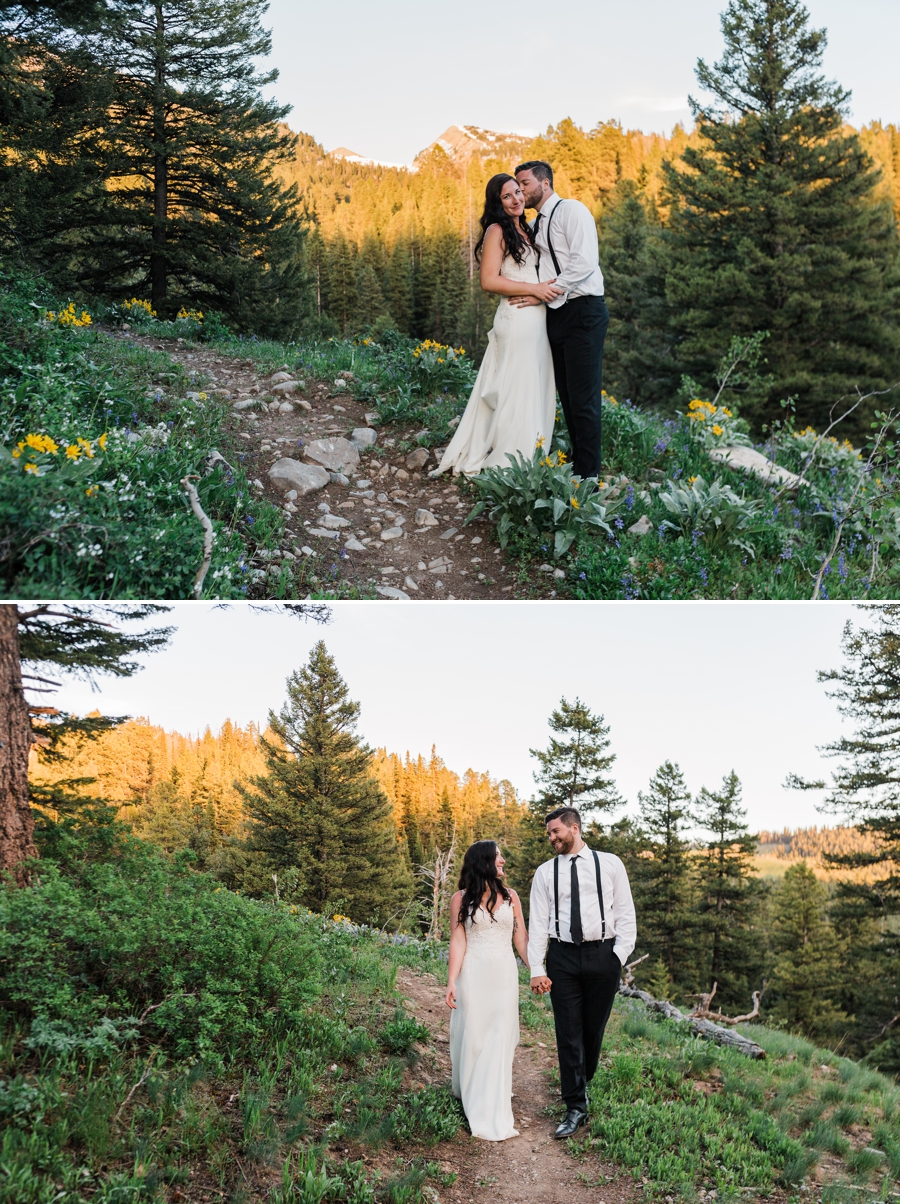 A bride and groom take photos with Jackson Hole wedding photographer Amy Galbraith during alpenglow at their wedding at Grand Targhee