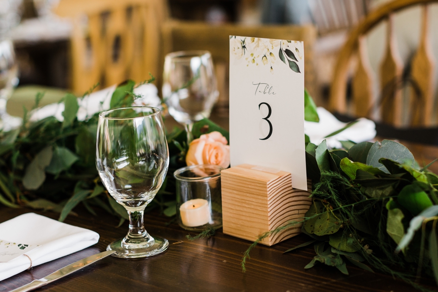 paper wedding table numbers for an eco-friendly wedding by seattle mountain wedding photographer amy galbraith