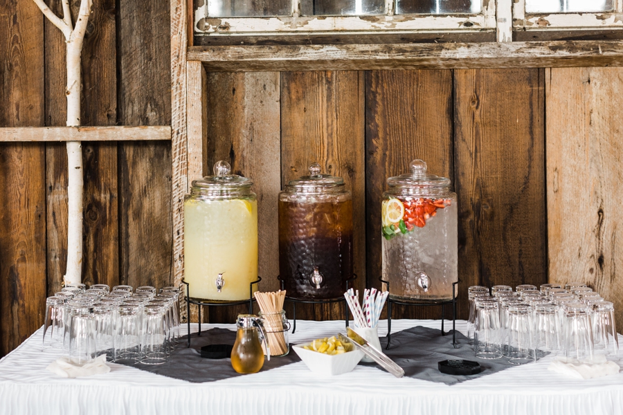 Water station at a wedding with glassware photographed by Seattle mountain wedding photographer Amy Galbraith