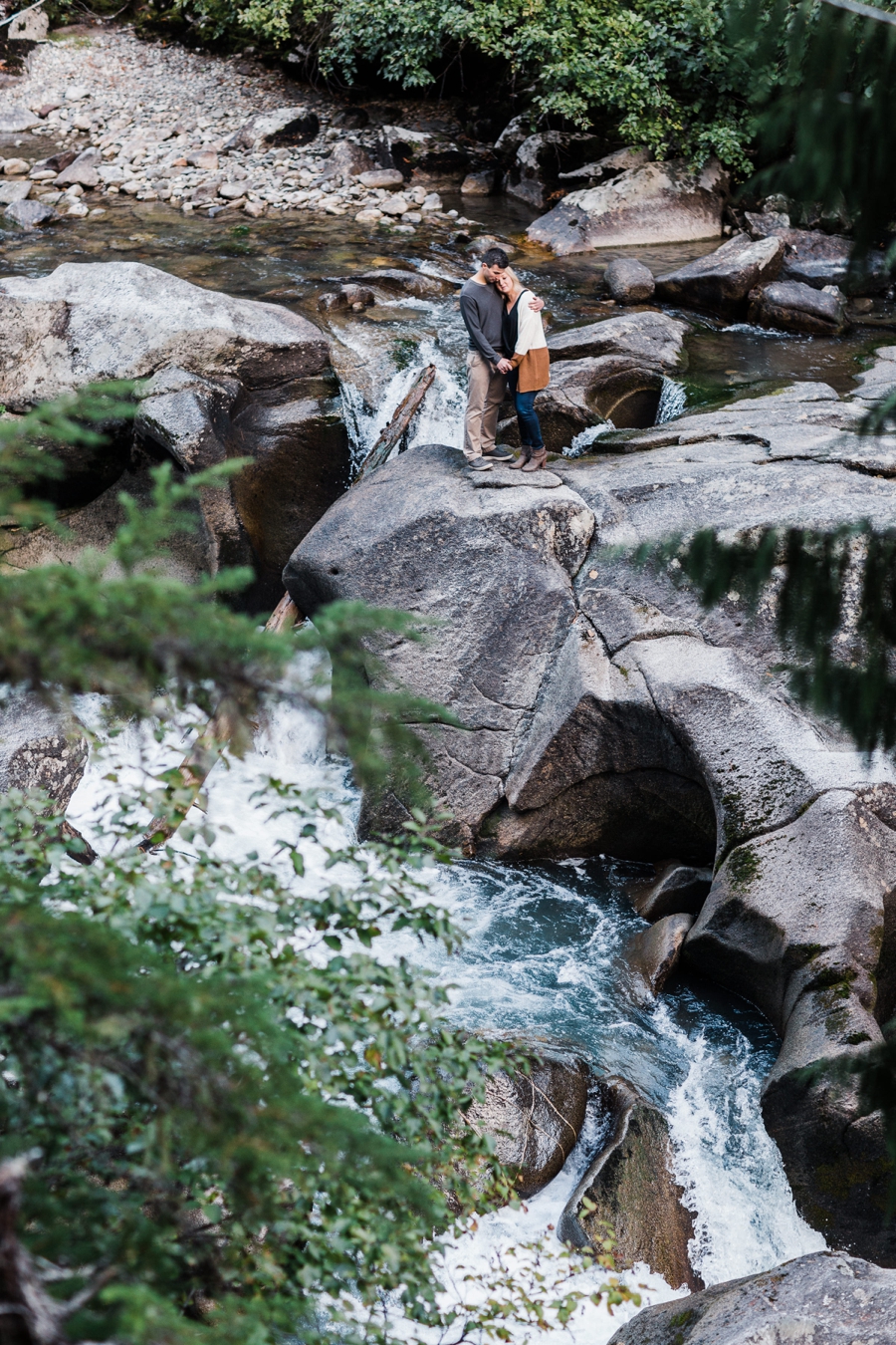 Mountain engagement session in Leavenworth with a waterfall by adventure wedding photographer Amy Galbraith