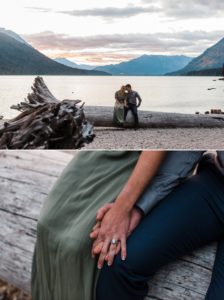 A couple snuggles together on a large fallen log at Lake Wenatchee during their mountain engagement photos at dusk at Lake Wenatchee by mountain wedding photographer Amy Galbraith