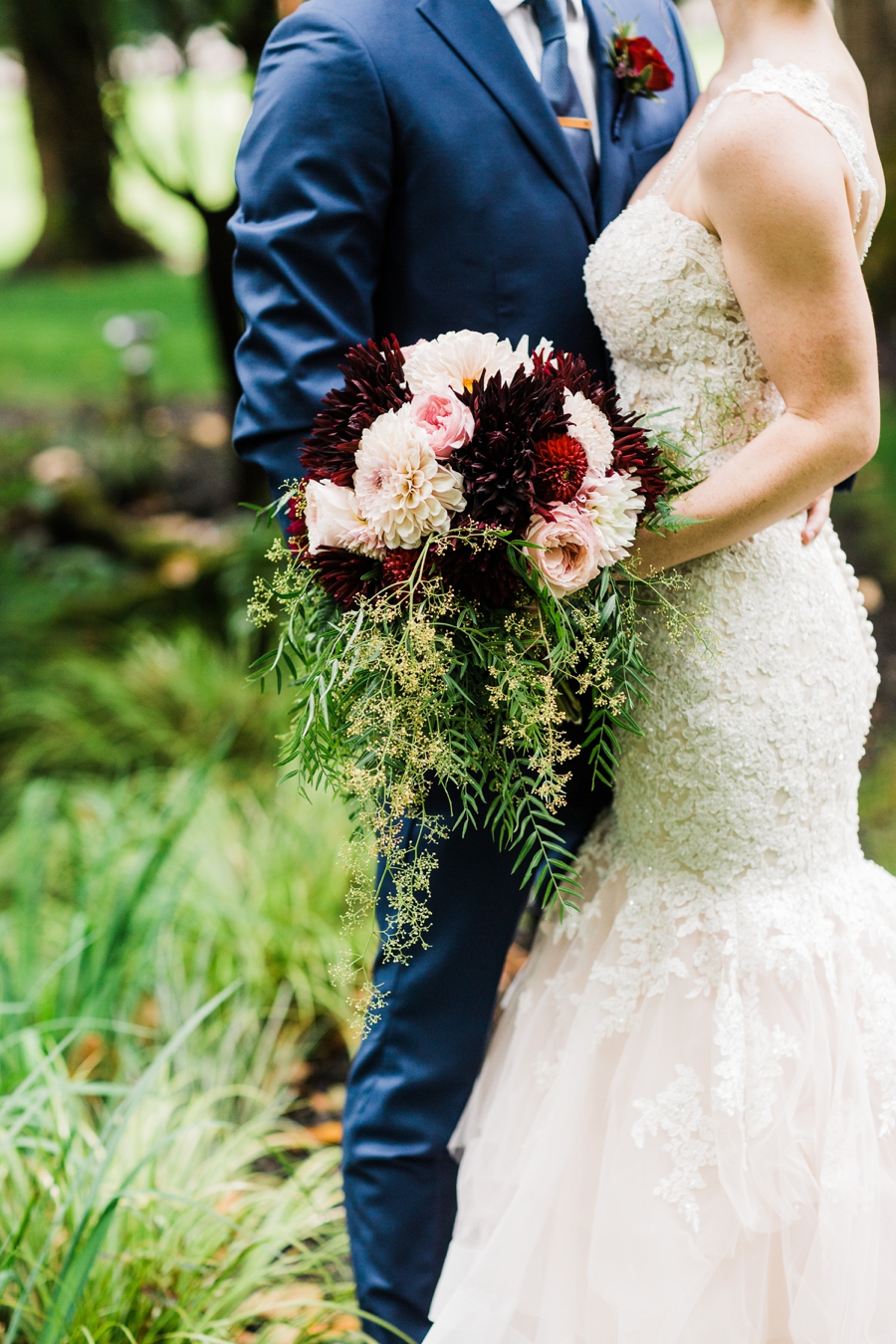 Pink and burgundy bridal bouquet at a Maroni Meadows wedding in Snohomish captured by Seattle wedding photographer Amy Galbraith