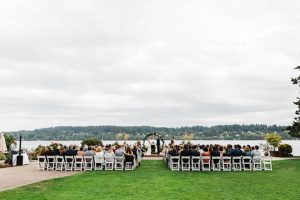A wedding ceremony at Kiana Lodge, photographed by Seattle outdoor wedding photographer Amy Galbraith