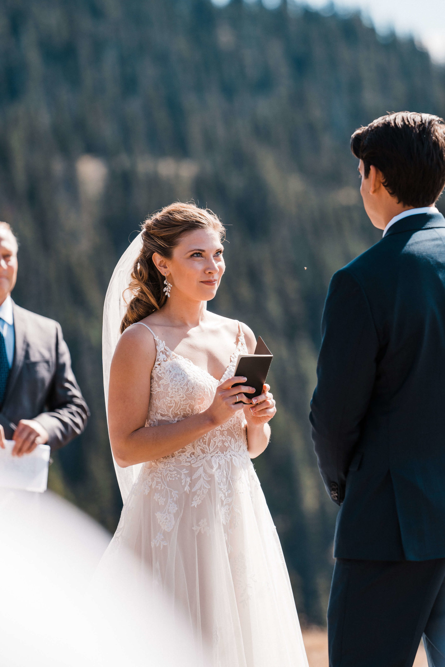 Bride and groom during elopement ceremony at Hurricane Ridge