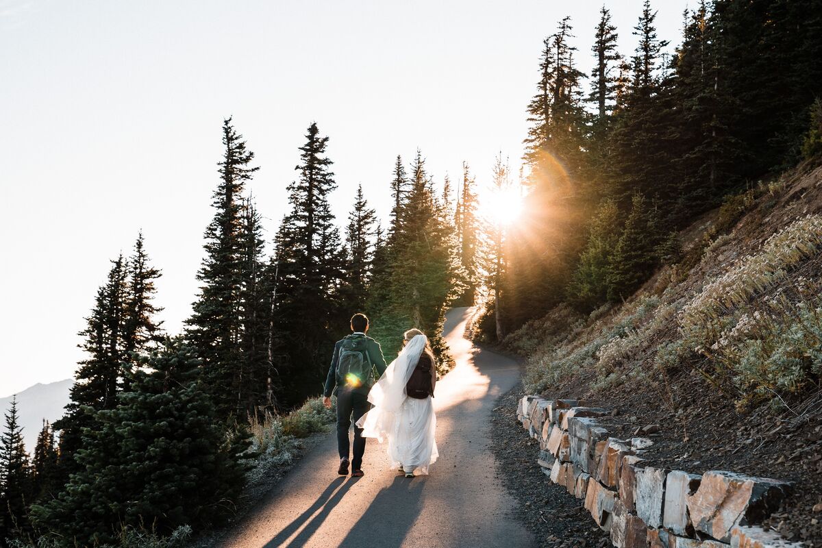Bride and groom hiking Hurricane Ridge for their elopement hike