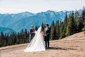 Bride and groom exchanging vows in Olympic National Park
