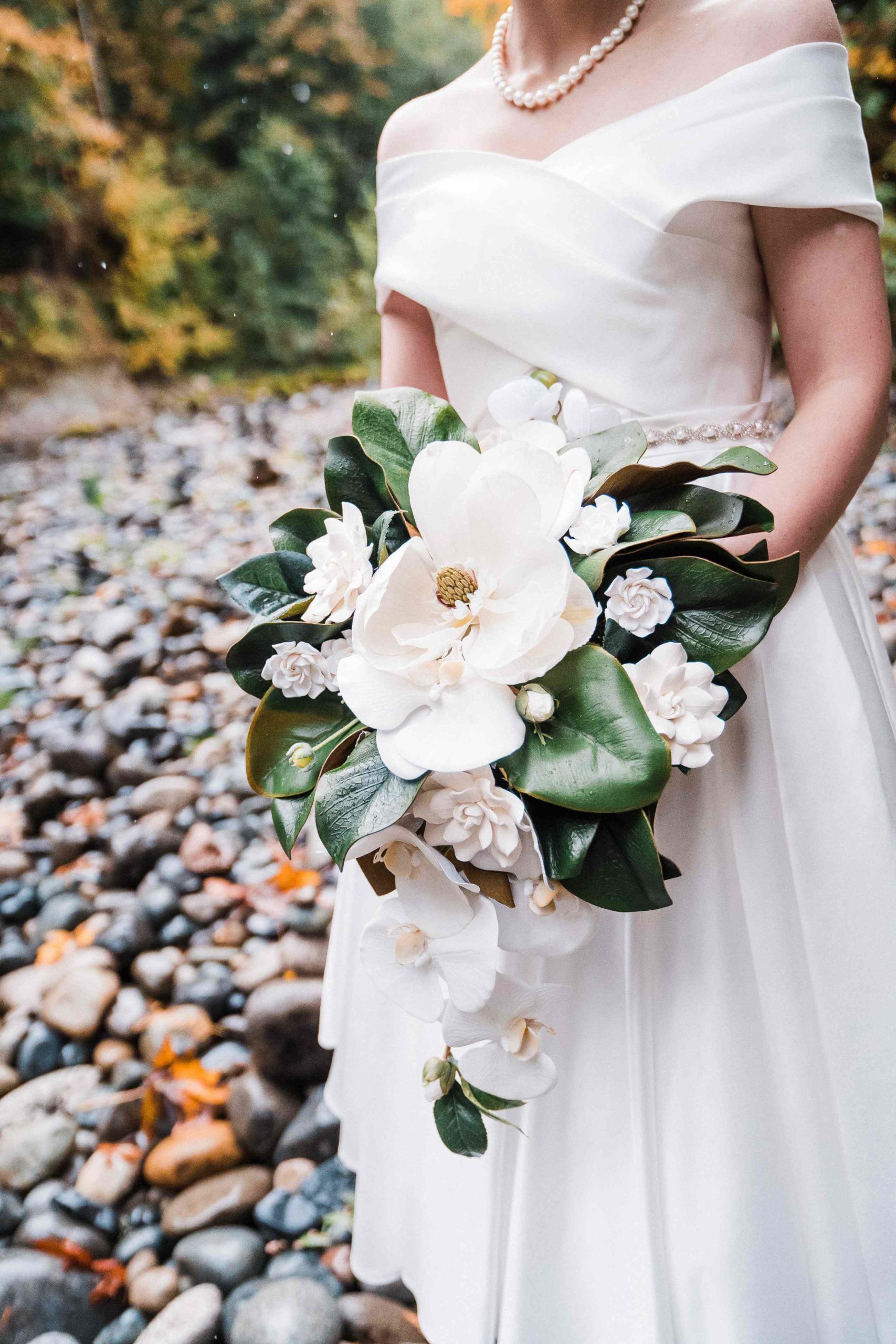 Large white florals with green leaves wedding bouquet