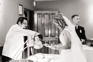 Private chef serving bride at her small wedding dinner reception