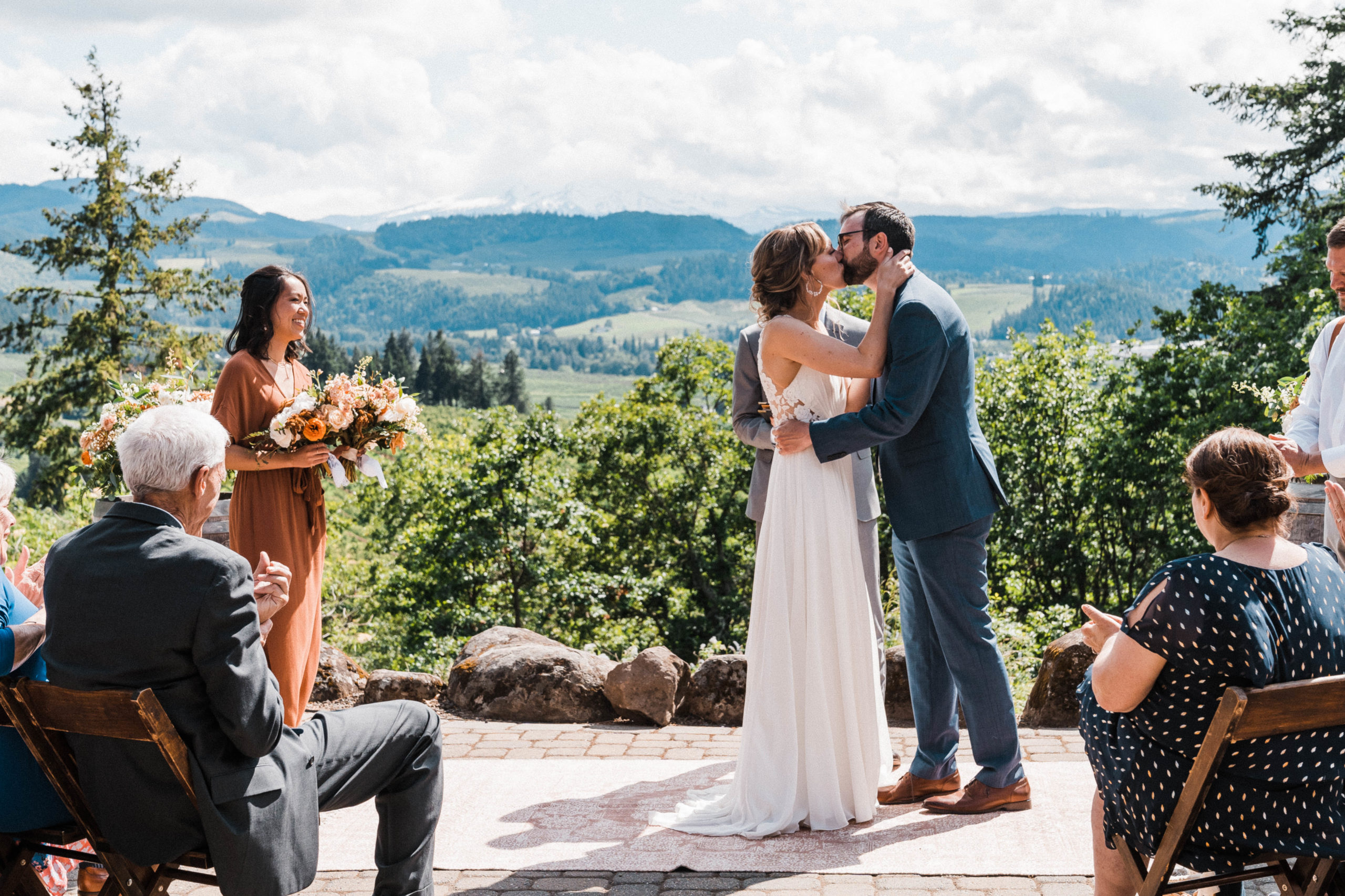 Bride and groom kiss during Hood River wedding ceremony