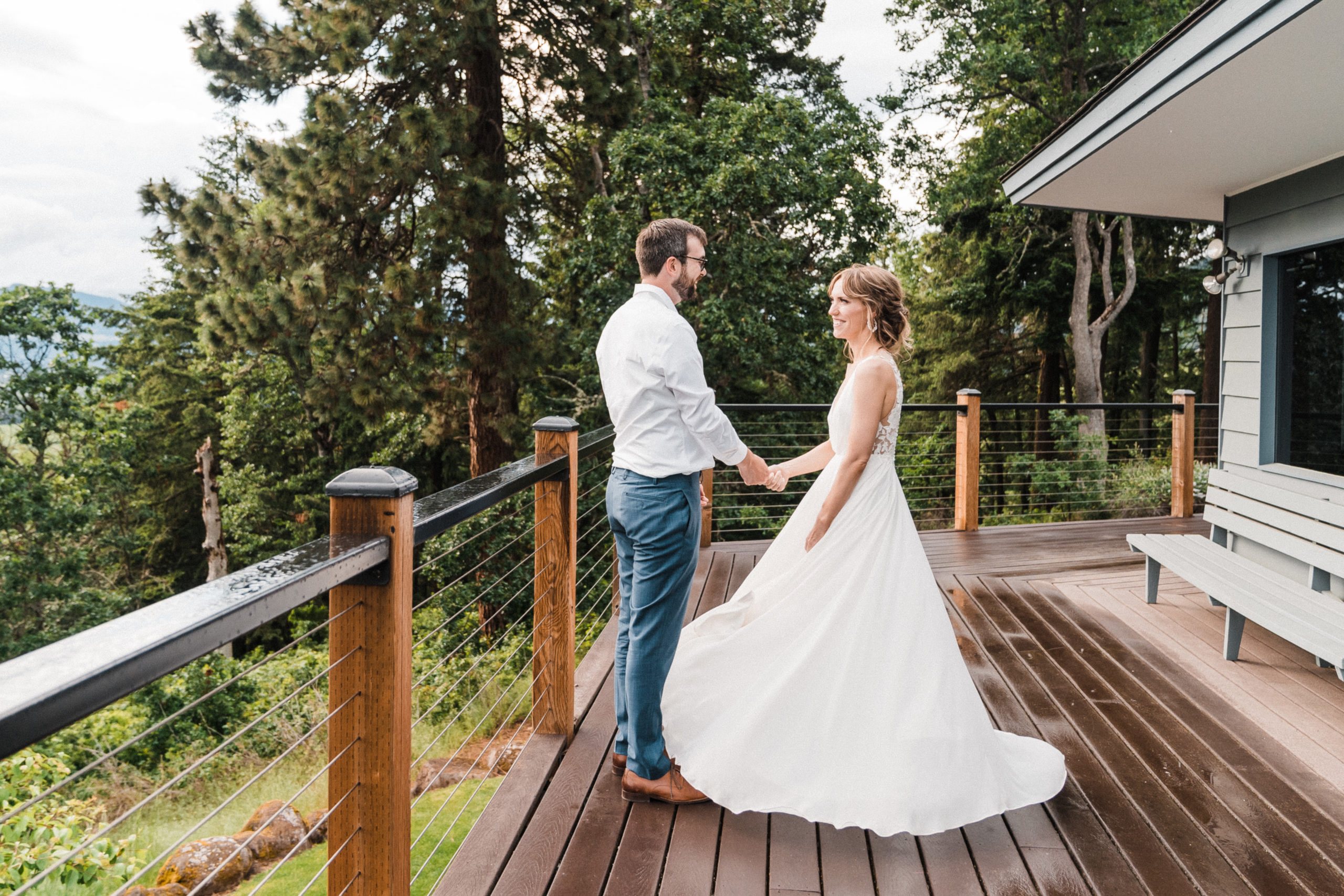 Bride and groom dancing on the deck during Oregon wedding in Hood River