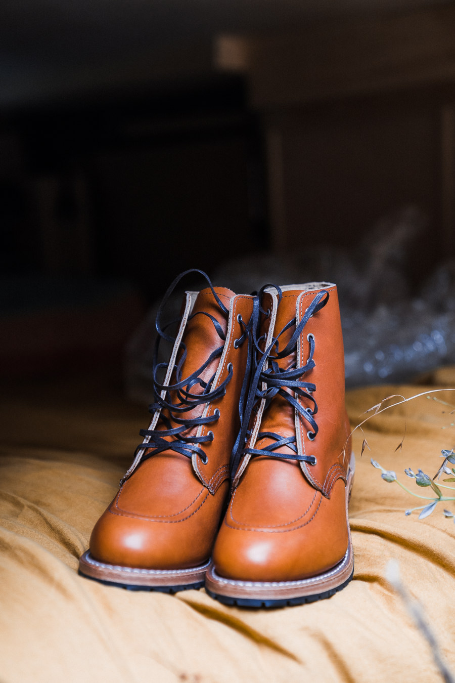 leather boots with blue laces for an elopement