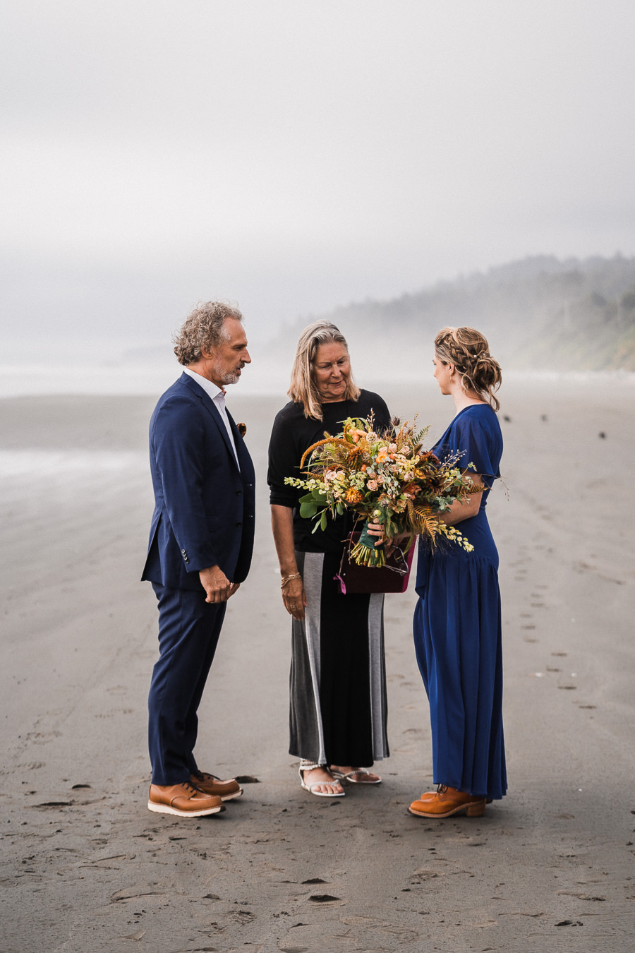 Bride and groom say their vows on Kalaloch Beach