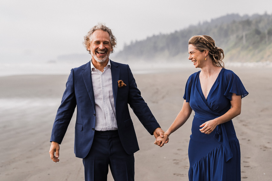 Bride and groom are joyful after getting married at Kalaloch Beach
